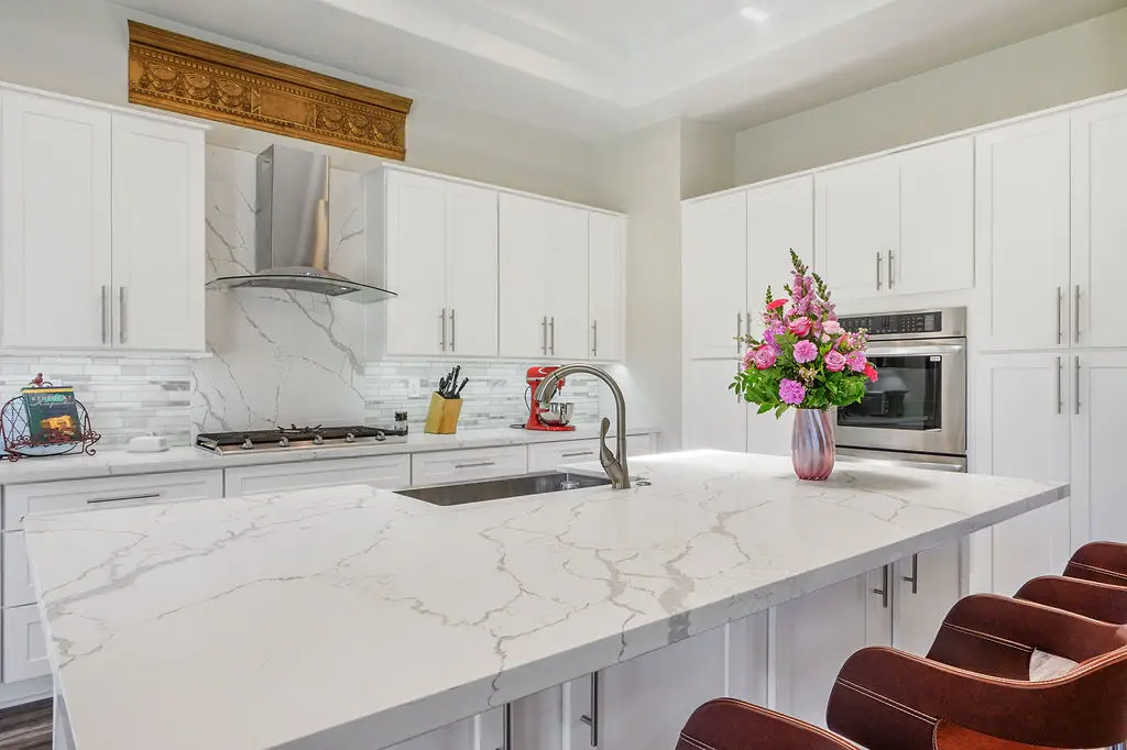 Aristocrat Floor Plan in Sun City Summerlin kitchen with island and stainless appliances