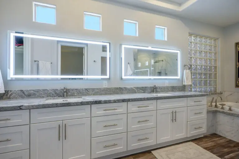 Aristocrat Floor Plan in Sun City Summerlin primary bathroom remodeled with marble and glass shower