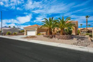 Windsor Floor Plan in Sun City Summerlin front exterior with three-bedrooms, two-bathrooms and generous outdoor living space.